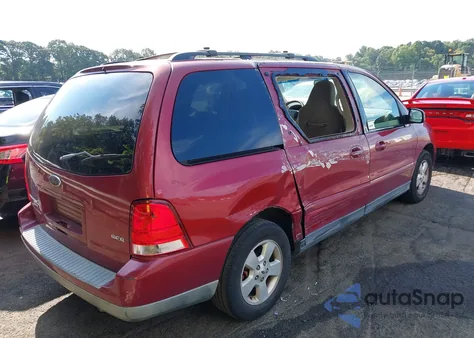 2004 Ford Freestar Ses из США, поврежденный, VIN 2FMZA57664BA37596